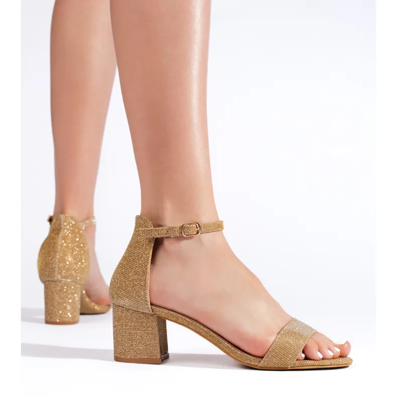 Gold high-heeled sandals with glitter golden