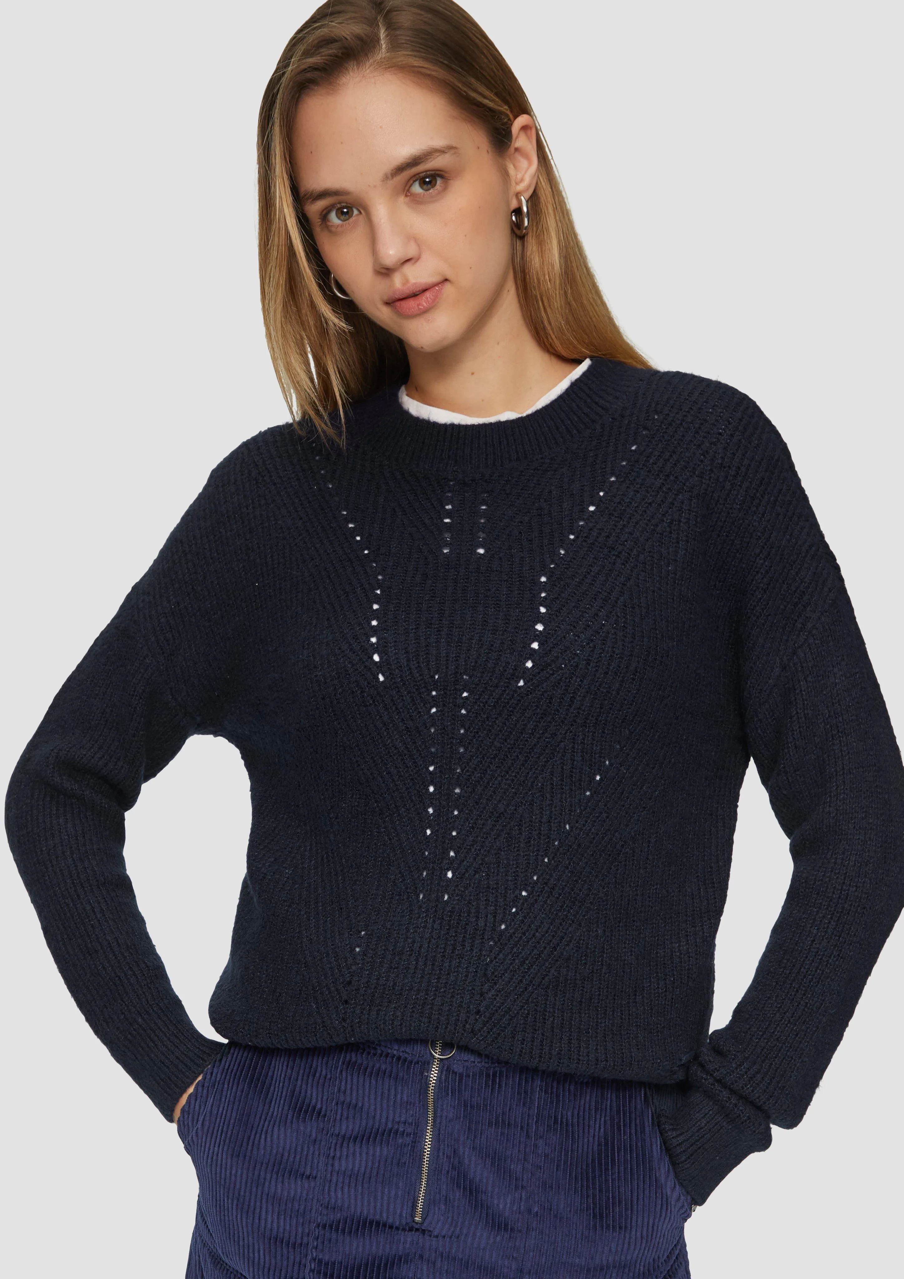 Pullover in melange look and openwork pattern on the neckline