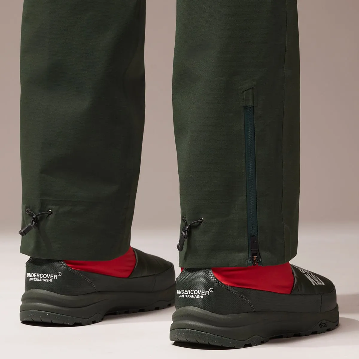 SOUKUU BY THE NORTH FACE X UNDERCOVER PROJECT U GEODESIC SHELL PANT DARK CEDAR GREEN | Bodega