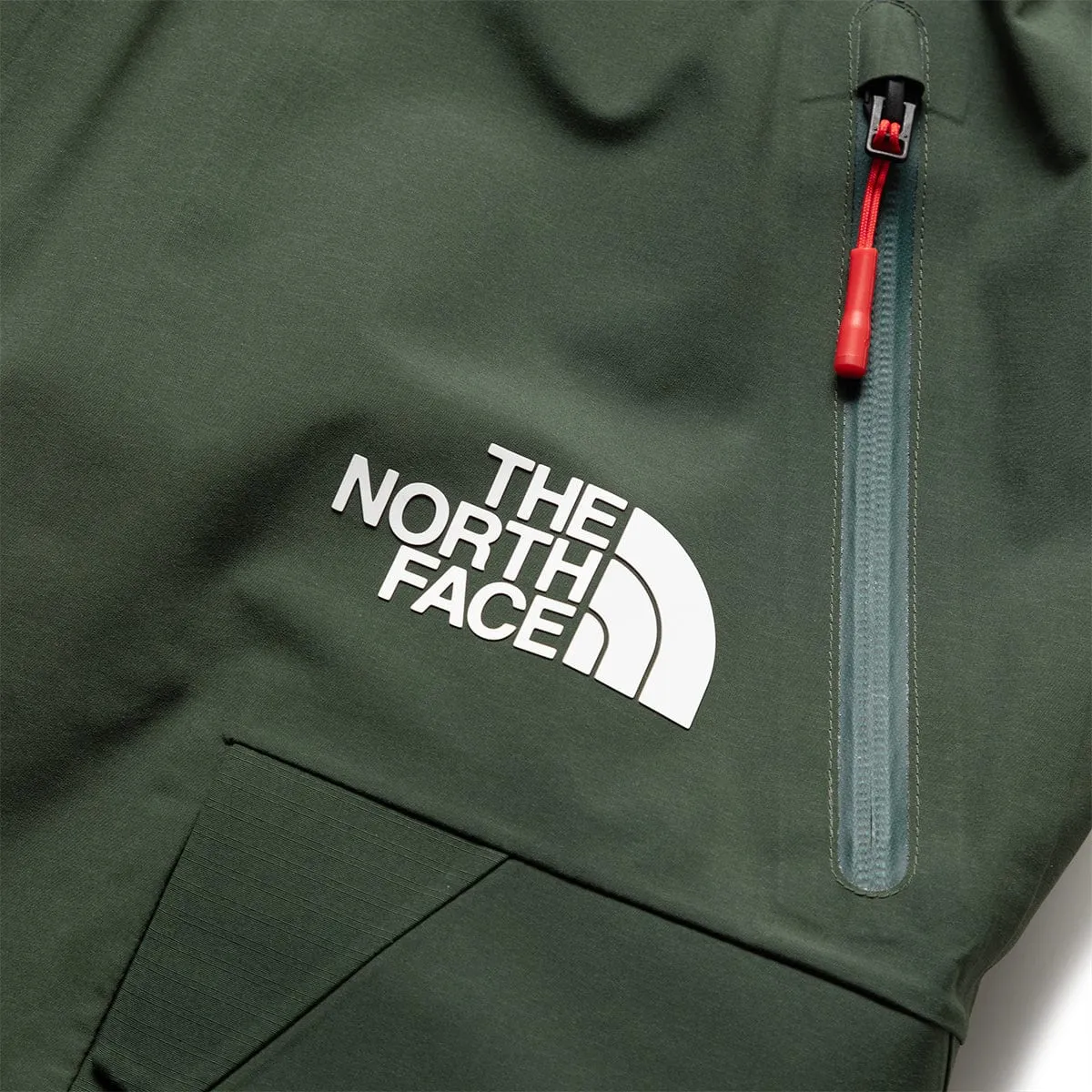 SOUKUU BY THE NORTH FACE X UNDERCOVER PROJECT U GEODESIC SHELL PANT DARK CEDAR GREEN | Bodega